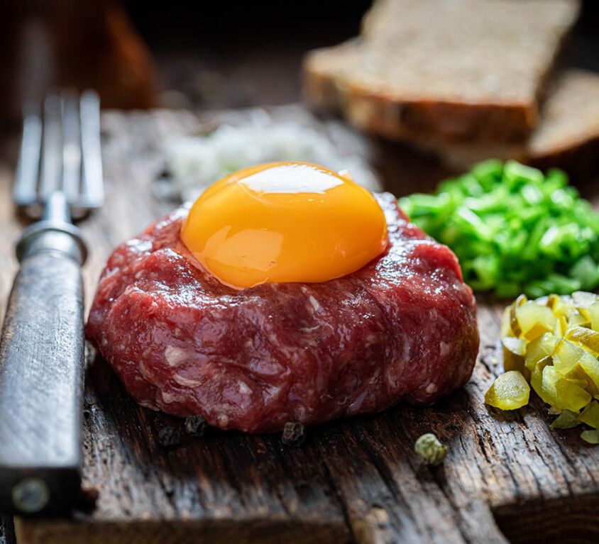 Delicious beef tartare with fresh and healthy ingredients